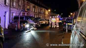 Driver in 'serious' condition after MPV crashes into parked car and house in Adamsdown