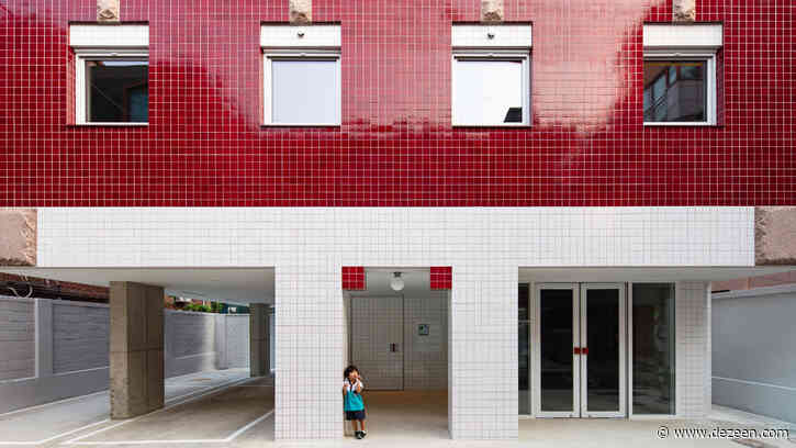 Blocky Minecraft-themed apartment building in Seoul clad with pixel-like tiles