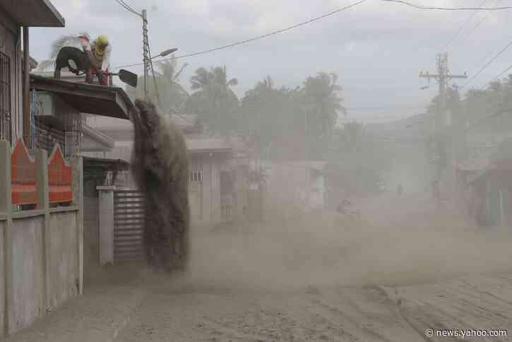 Philippine volcano simmers, officials brace for long crisis