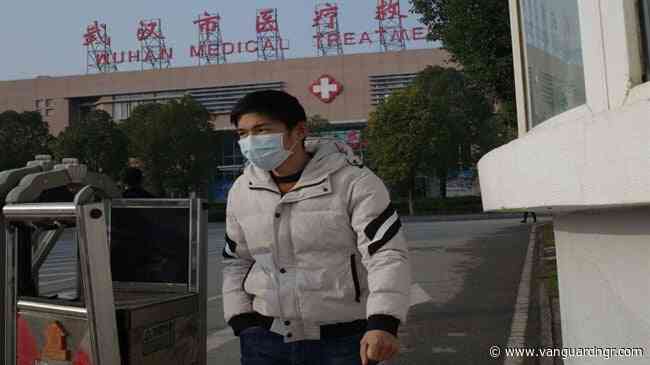 China reports new virus cases, raising concern globally before key holiday