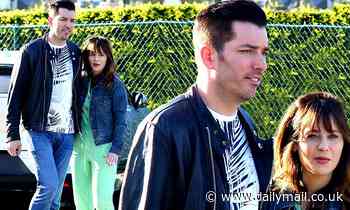 Zooey Deschanel cuddles up to boyfriend Johnathan Scott one day after her birthday 