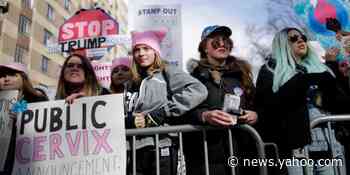 The National Archives blurred out signs criticizing Trump in an exhibited photo of the Women's March