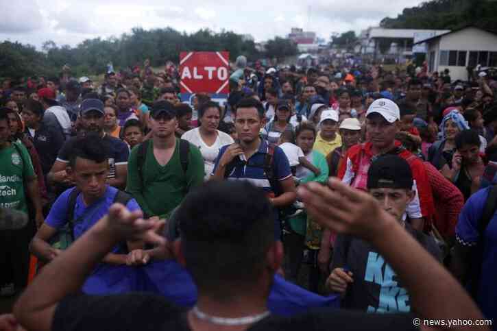 Migrants enter slowly at Guatemala-Mexico border after scuffles