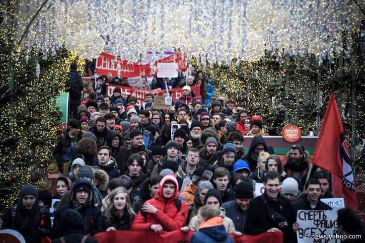 Russian activists take aim at Putin in march against repression
