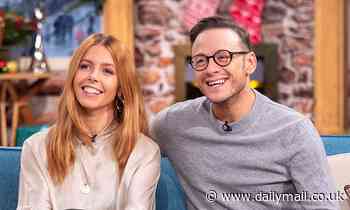 Kevin Clifton cheers on Stacey Dooley from the audience while she hosts the Strictly live tour