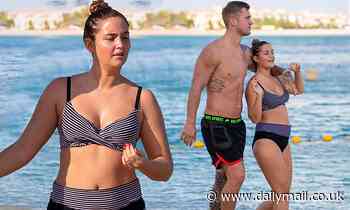 Jacqueline Jossa puts on a loved-up display with husband Dan Osborne in Dubai