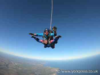 Funeral director takes her first flight - then jumps out plane