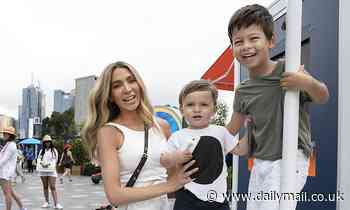 Nadia Bartel dotes over her two boys at the Australian Open tennis