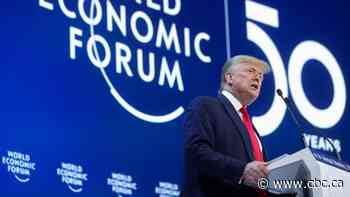Trump lauds U.S. economy at Davos as trial set to begin in Washington