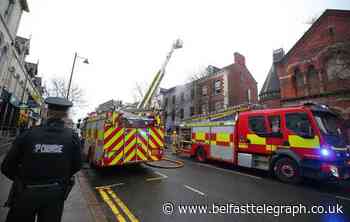 Firefighters back at Belfast University Road as blaze 'reignites'