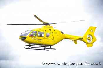 East Lancs Road closed as woman seriously injured in crash