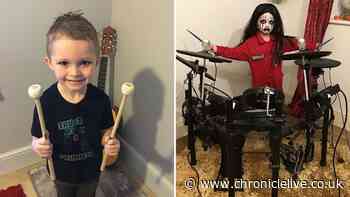 Talented five-year-old shows off his amazing drumming skills at Slipknot concert