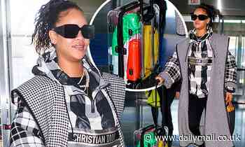 Rihanna rolls through the airport with a bizarre CLEAR suitcase and $2,950 coat