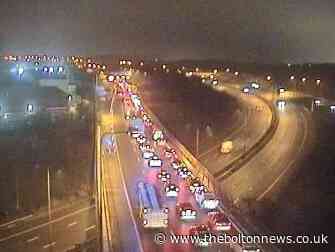 M61 blocked after crash causes long delays near Bolton