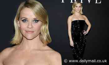 Reese Witherspoon looks effortlessly chic at Giorgio Armani's PFW show