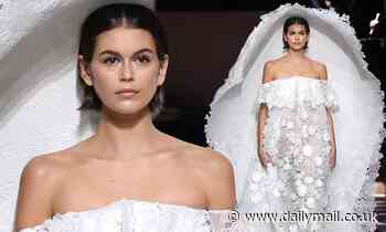 Kaia Gerber turns the Givenchy catwalk into her very own wedding chapel