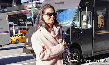 Katie Holmes bundles up in blush winter coat for a meeting at Madison Square Garden in NYC