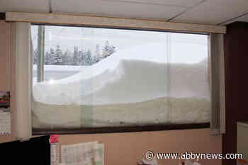 PHOTOS: Heavy snowfall breaks window, causing avalanche into B.C. newsroom office