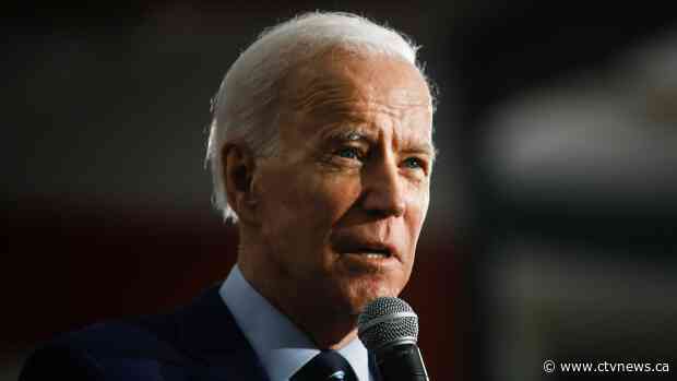 Campaigning in Iowa, Biden largely avoids impeachment politics