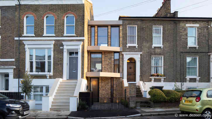 Skinny house built in gap for Victorian coach house in London