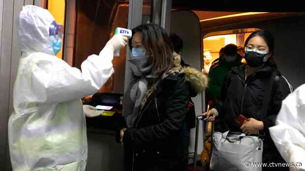 Chinese city stops outbound flights, trains to fight virus