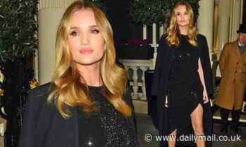 Rosie Huntington-Whiteley exudes glamour in black shimmering gown