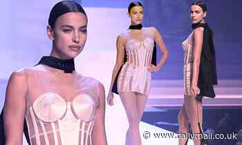 Irina Shayk flaunts figure in a semi-sheer corset dress during Jean Paul Gaultier's final show