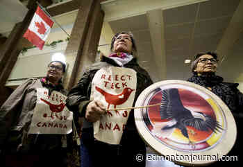Indigenous-led climate protesters occupy Canada Place against proposed mine