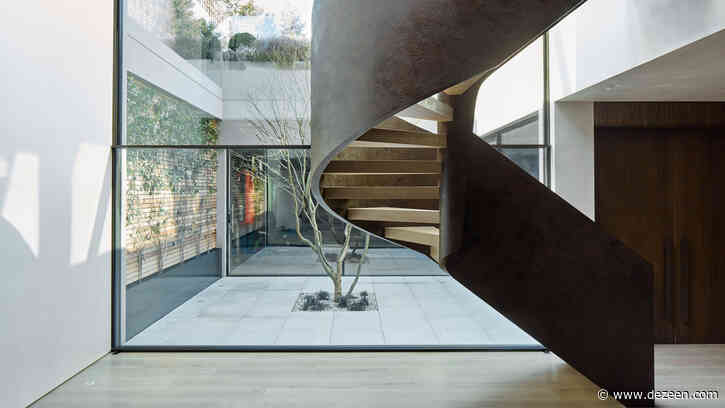 Staircase swing and material details add flair to Highgate house