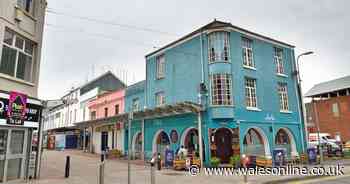 A prominent building in Llanelli town centre dating back to the 1800s is set to be  demolished