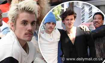 Justin Bieber joins Shawn Mendes to honor Universal Music Group CEO with Star on Walk of Fame