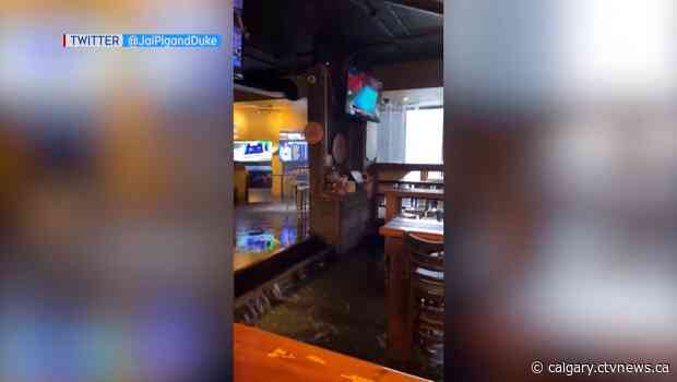 Bars serve up help for rival devastated by flooding