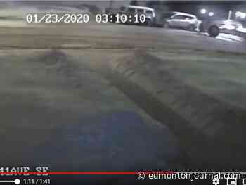 Video: Snow grader plows into parked vehicles