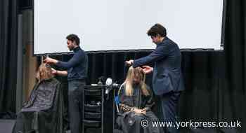 Celeb duo visit college