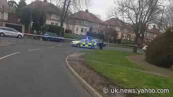 Man arrested as bomb squad joins searches of homes