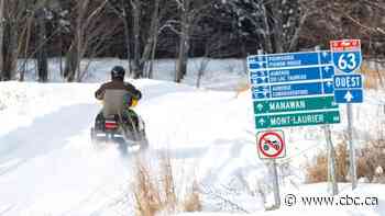 Quebec tightens rules on adventure tourism as search for snowmobilers continues