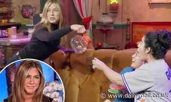 Jennifer Aniston gives unsuspecting fans an extra 'Perk' by jumping out from behind Friends couch