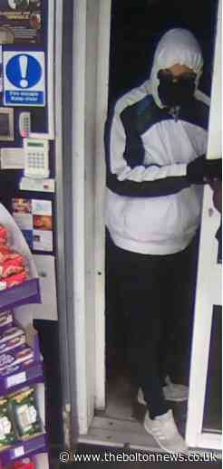 Police release pictures of duo who raided Breightmet Coop