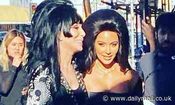 Kim Kardashian and her idol Cher are seen in matching black wigs