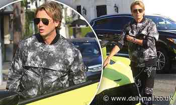 Jonathan Cheban seems to be doing very well these days as steps out of a $280K Aston-Martin