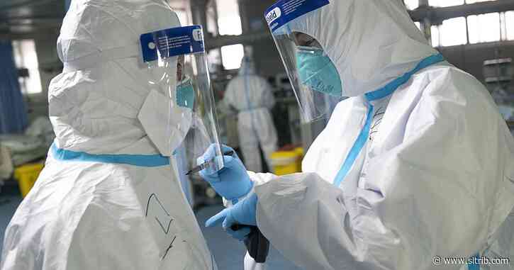 China expands lockdown against coronavirus to 36 million, building hospital in 10 days