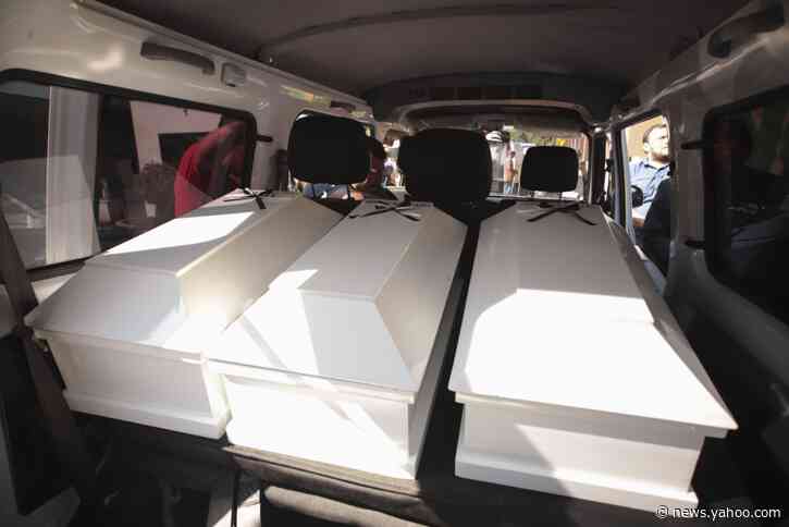 Family receives remains of 6 killed in El Salvador massacre