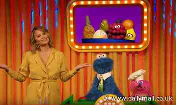Chrissy Teigen lands dream role on Sesame Street with beloved children's character Cookie Monster