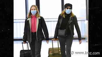 Felicity Huffman & Daughter Wear Masks at Airport Amid Coronavirus Scare