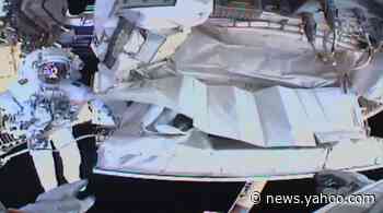 Spacewalking astronauts plug leak, finish fixing detector