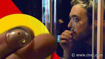 First look at a tiny display made to sit on your eye video     - CNET