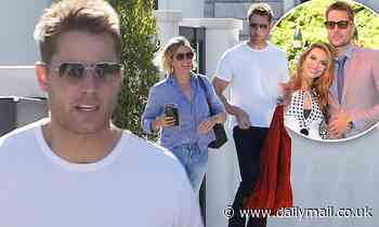 Justin Hartley leaves his house with a female friend... following split from wife Chrishell Stause