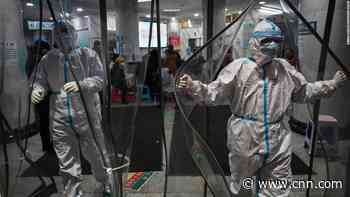 China says coronavirus can spread before symptoms show