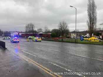 Man, 53, seriously injured in car and bike crash in Whitefield