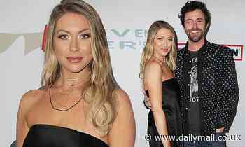 Stassi Schroeder keeps in simple in classic black for Grammy's charity event with fiance Beau Clark